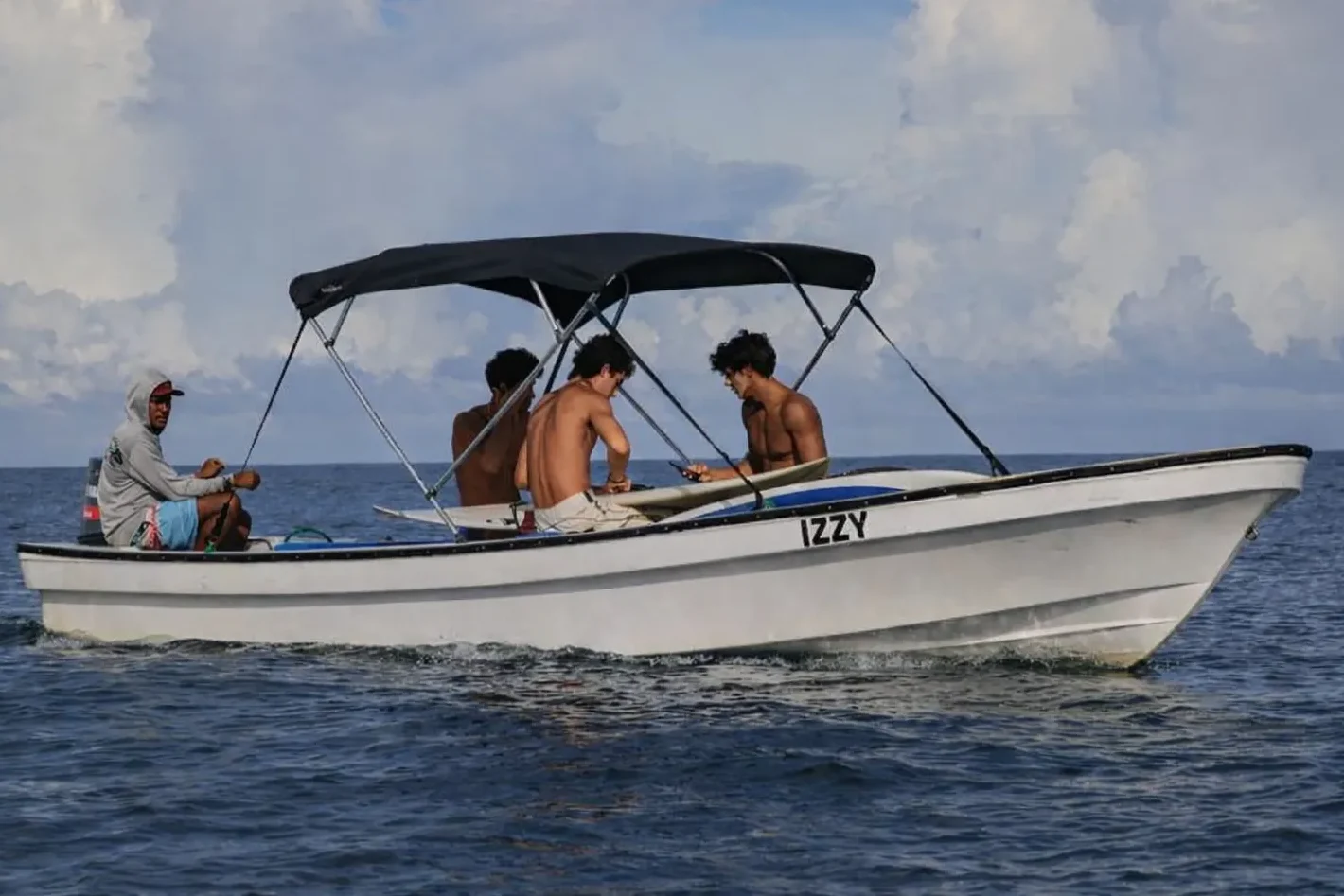 Fast charter boat with shade canopy on Fiji waters